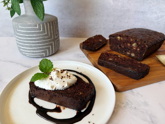 Chocolate Protein Banana Bread with Whipped Cream Topping